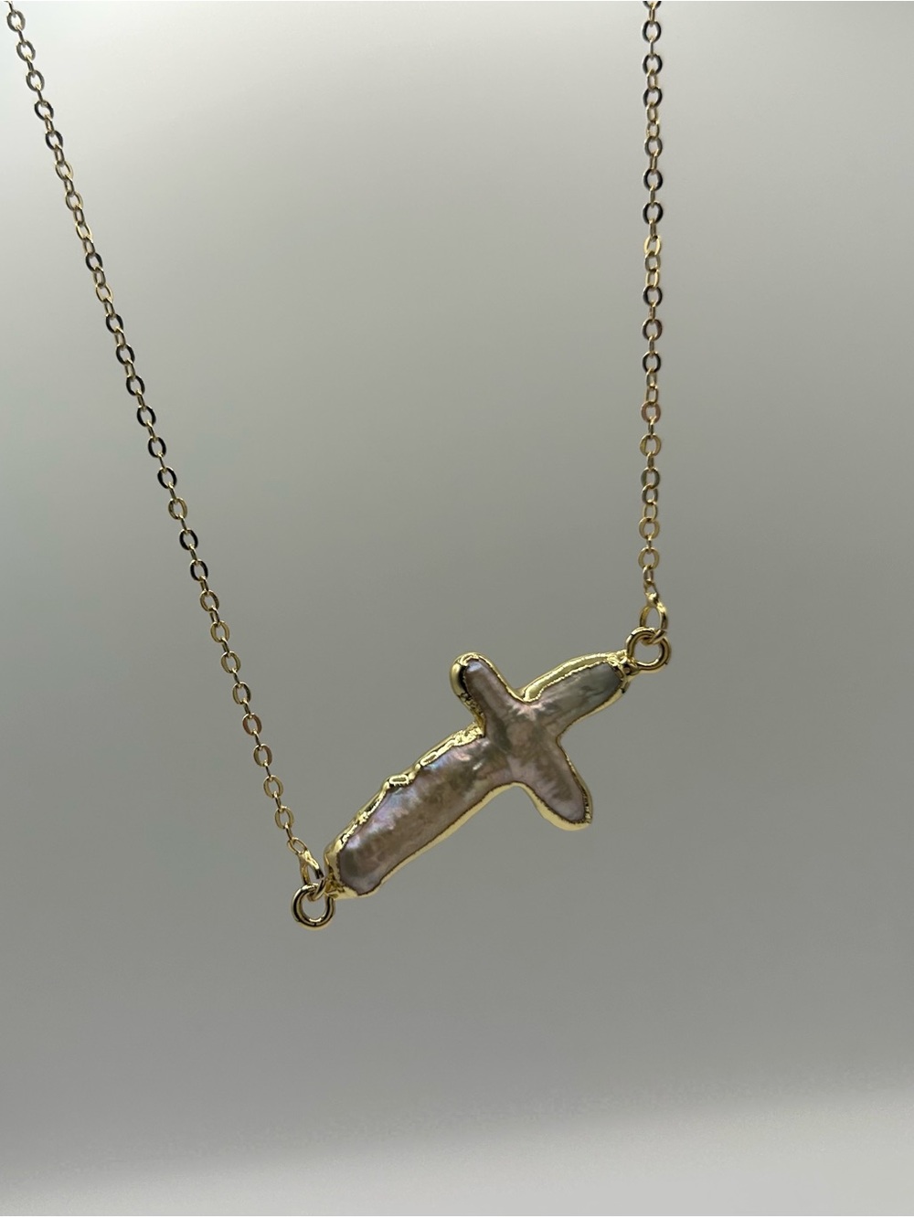 Electroplated freshwater pearl cross natural sideways necklace